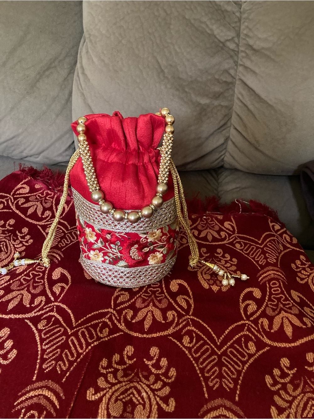 Red Embroidered Drawstring Potli Clutch with Gold Bead Handle
